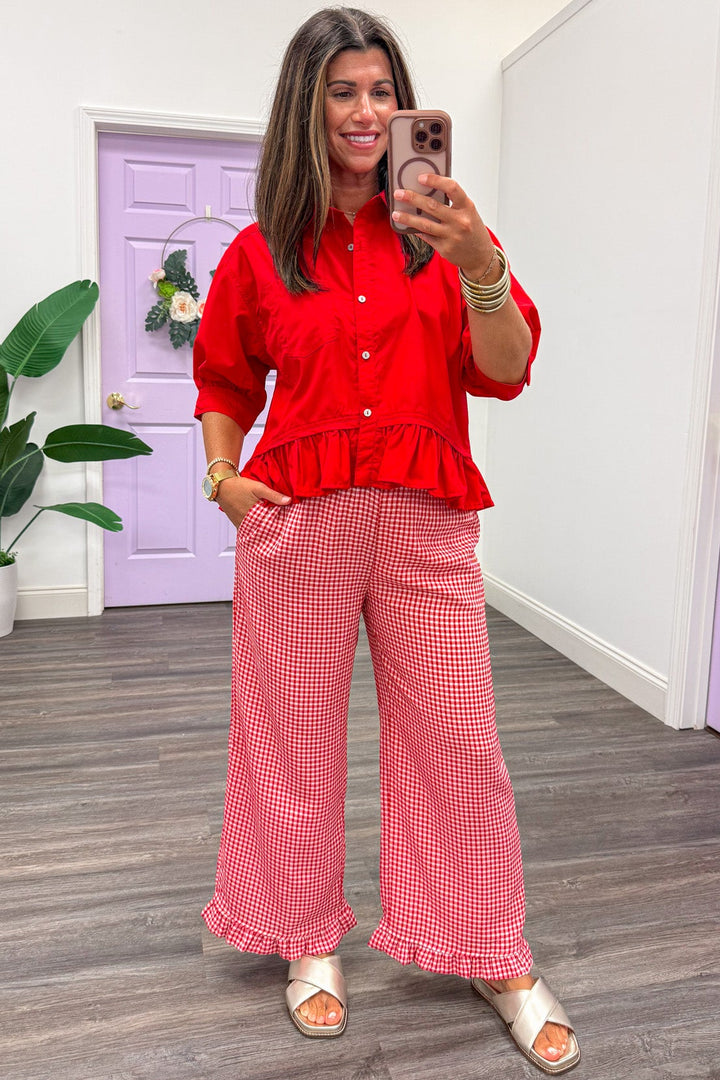 solid red button front puff sleeve ruffled hi-low hemline semi-cropped peplum top