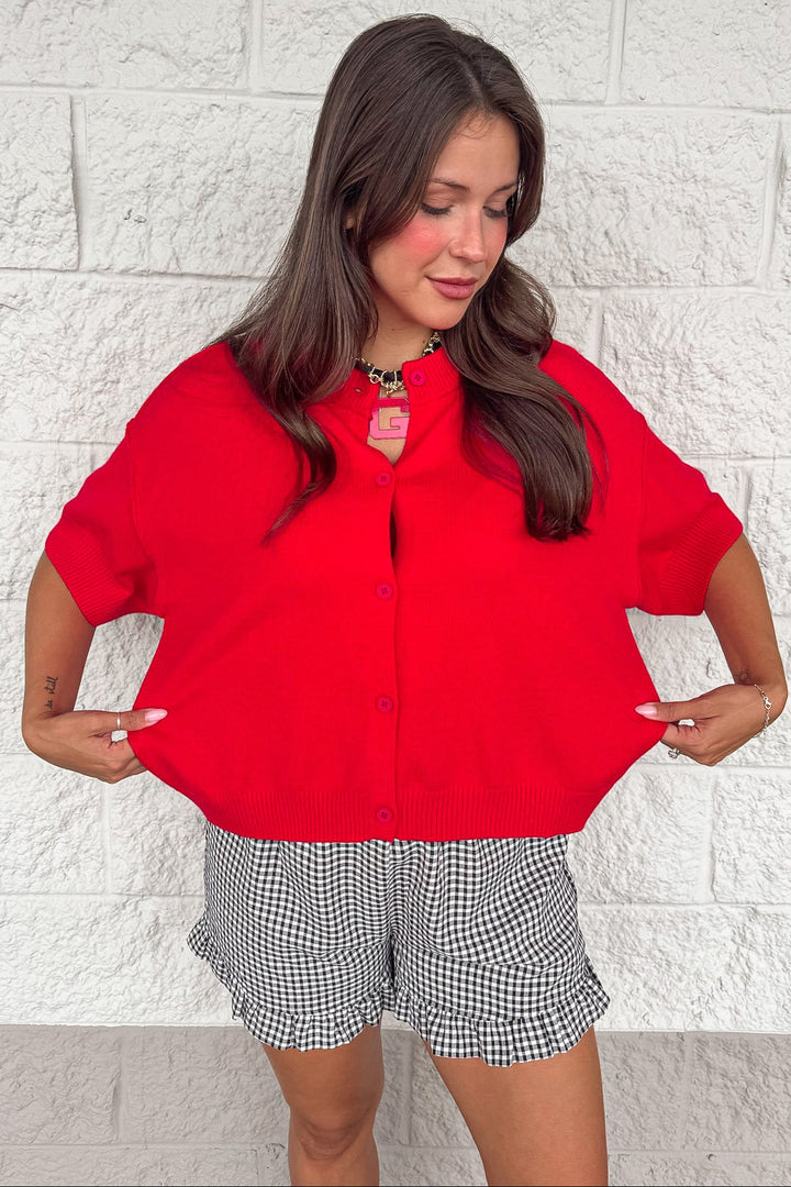 solid red crew neckline button front semi-cropped relaxed silhouette knit cardigan top