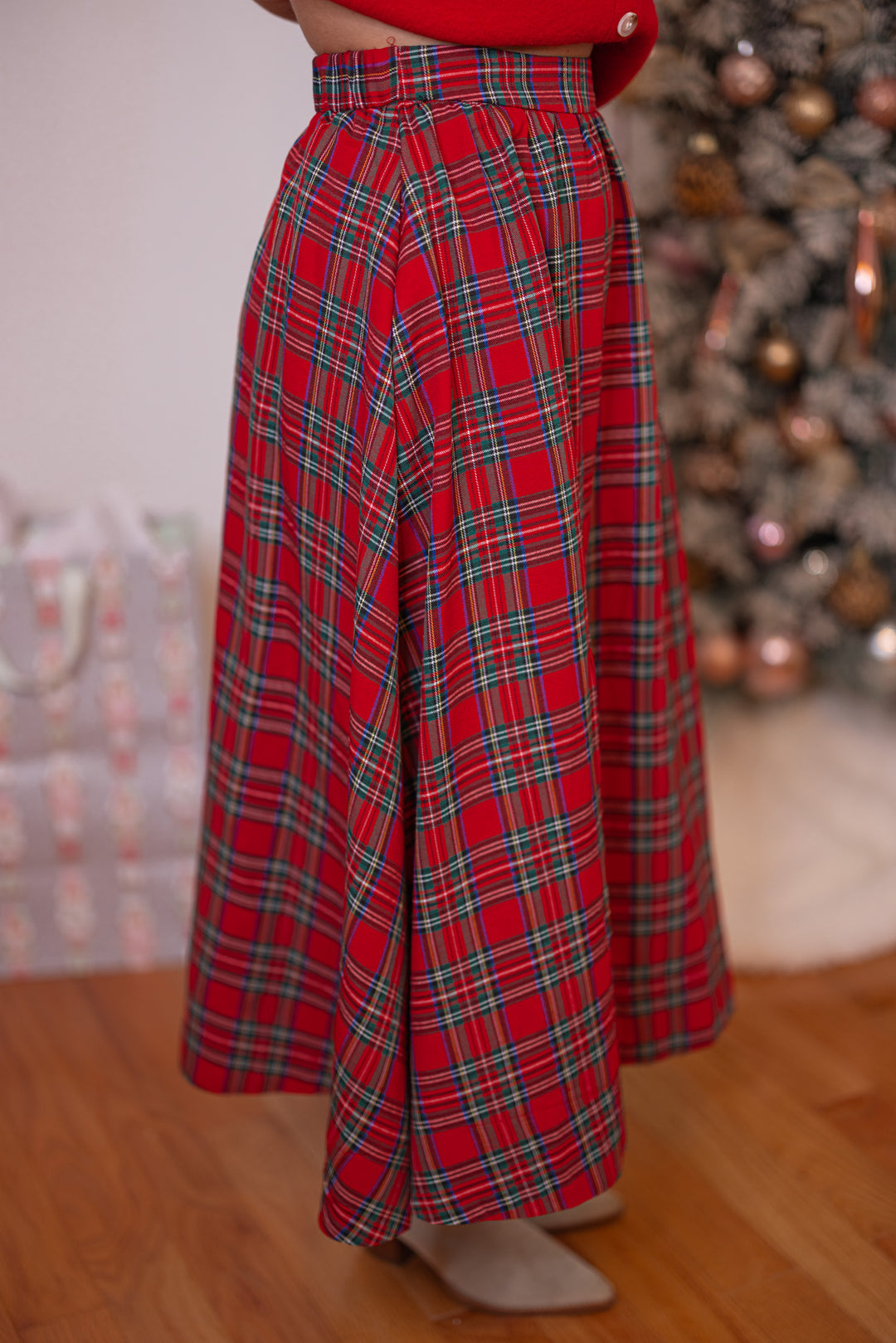 Women's red and green plaid midi skirt by Entro showing side view