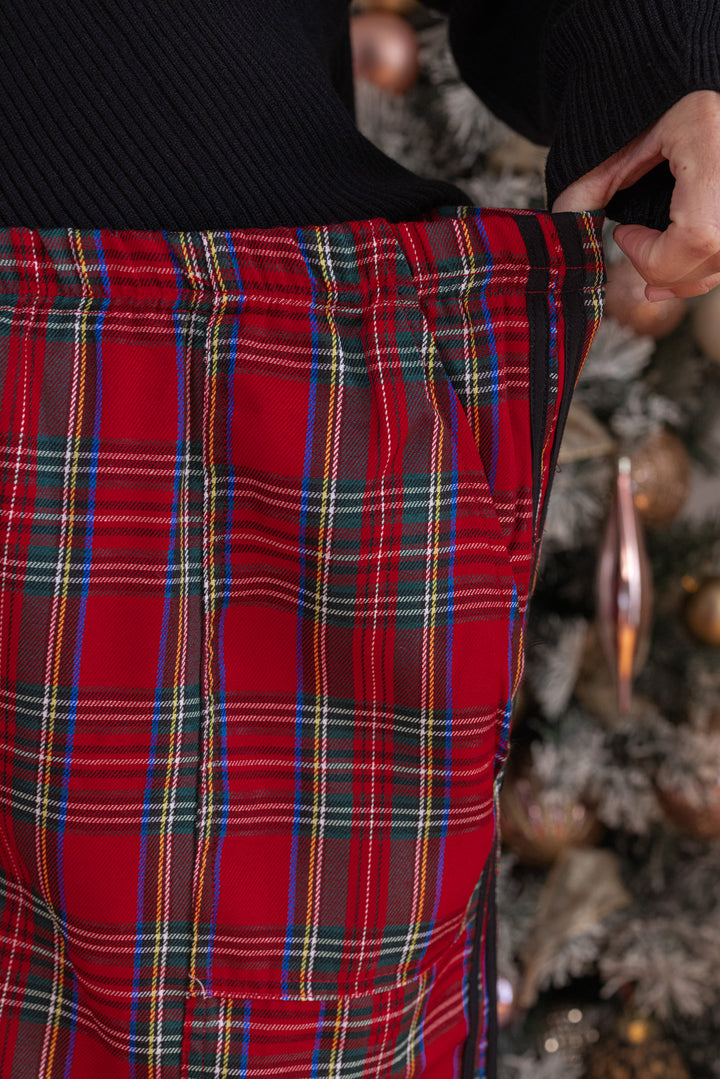Women's red plaid wide leg adjustable jogger pants with side slits and bow ties by So Me showing elastic waistband