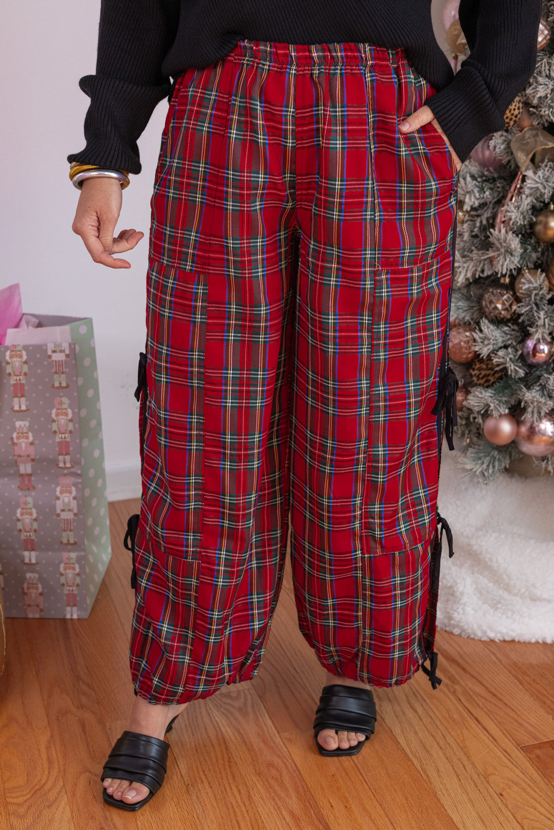 Women's red plaid wide leg adjustable jogger pants with side slits and bow ties by So Me
