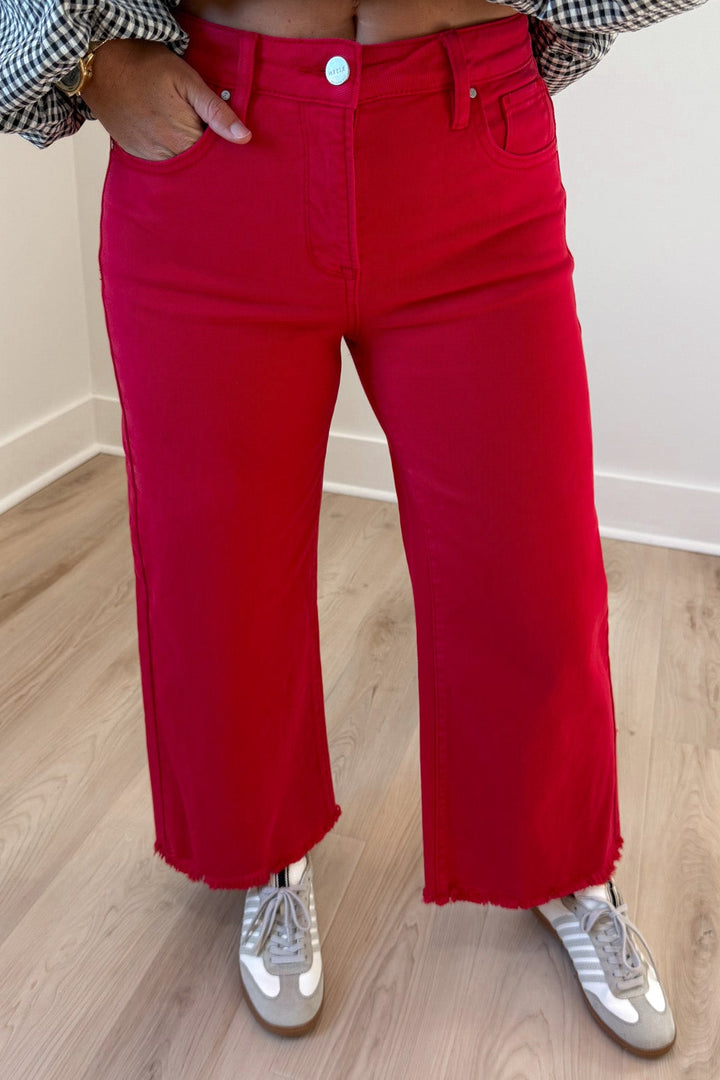 solid red denim high rise cropped wide leg frayed hem tummy control jeans with front pockets