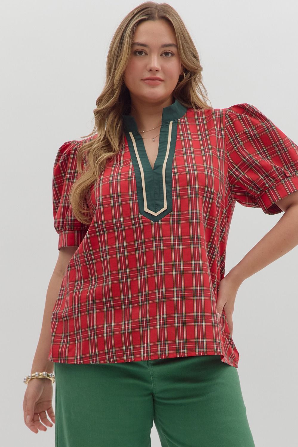Women's red and green plaid top with green and cream trimmed v neckline by Entro in plus