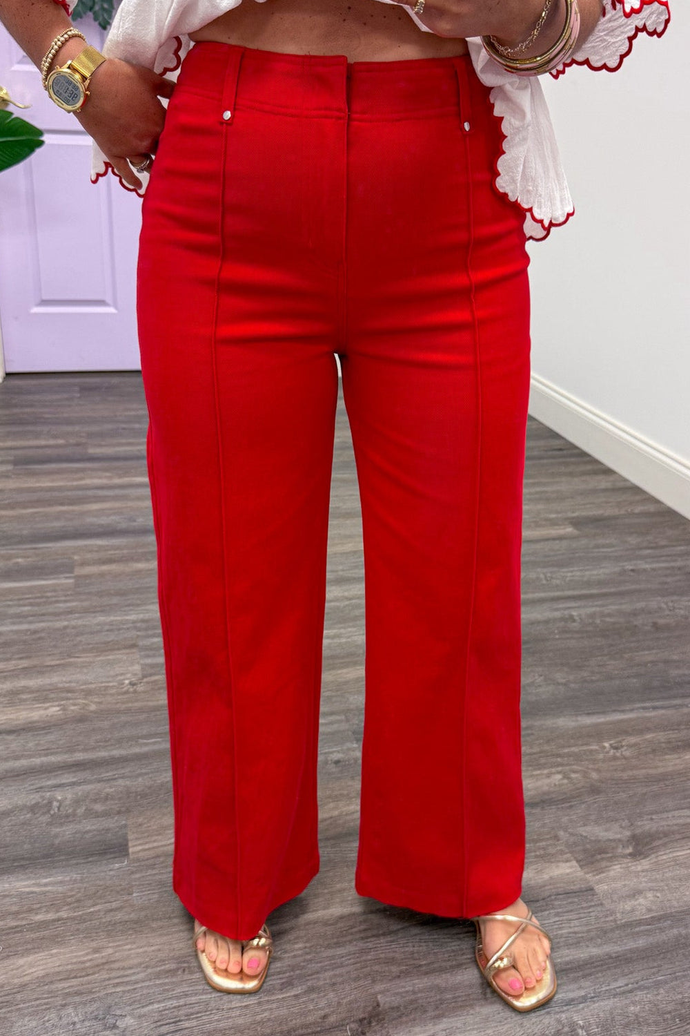 red high rise wide leg front closure denim pants with pintuck seam detail