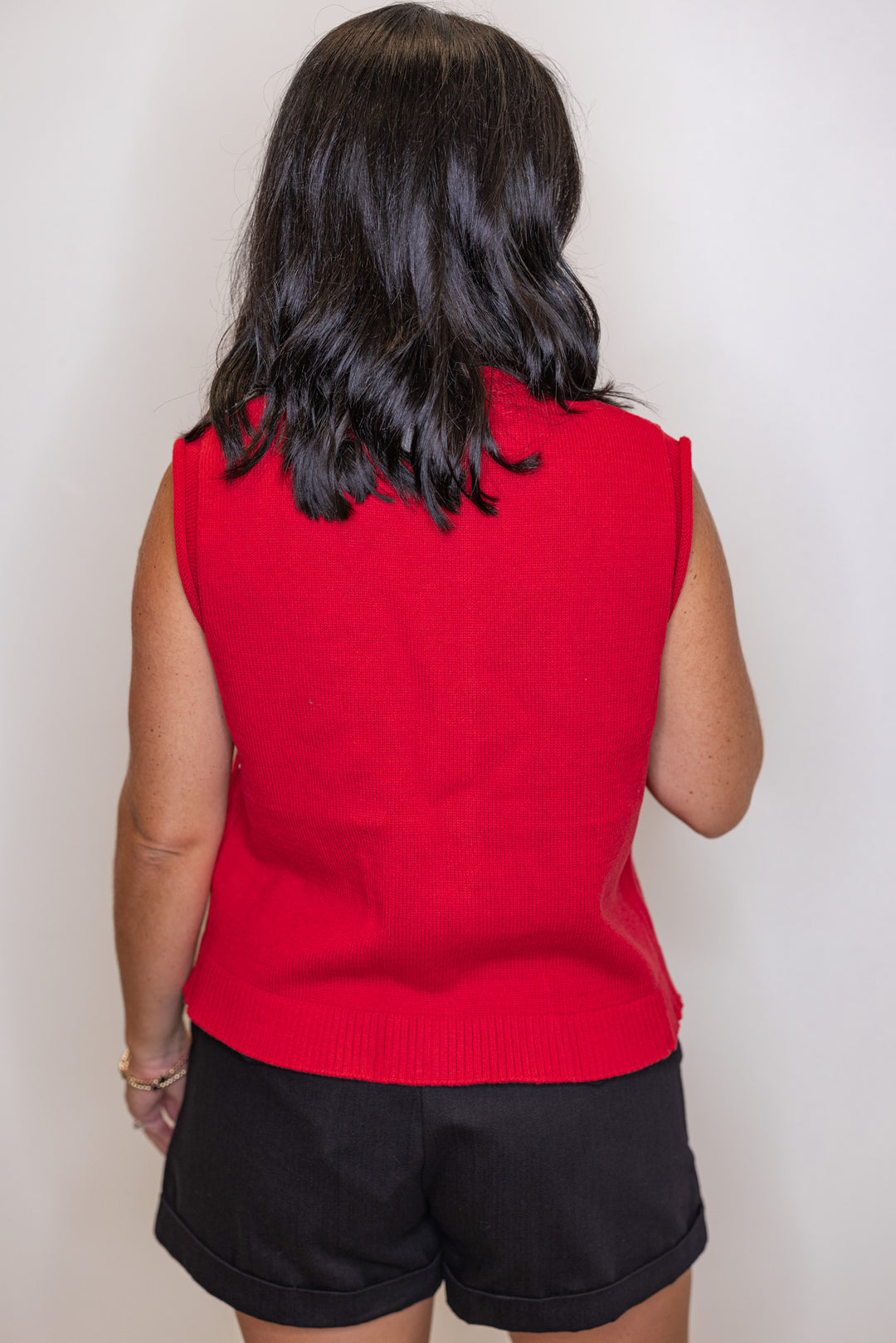 Red knit button front sleeveless sweater vest by Wishlist showing up close back view