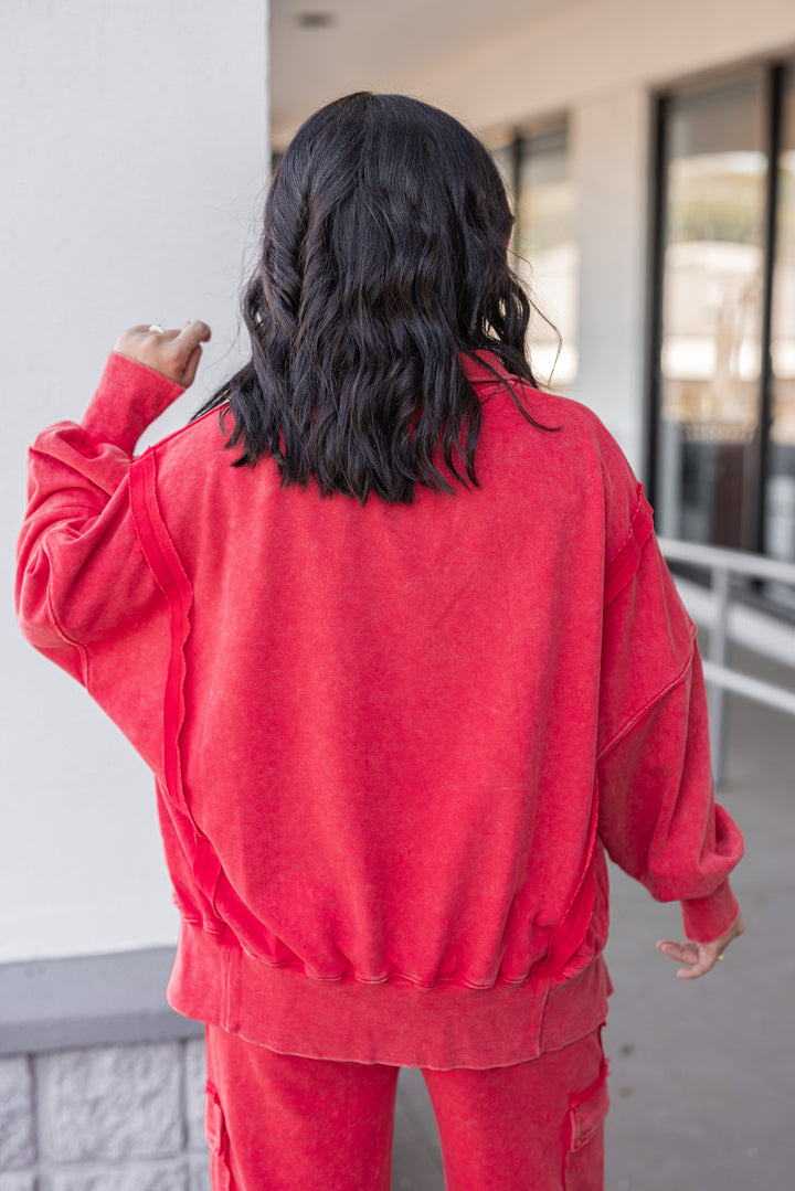 Women's washed red french terry knit pullover top with snap front bodice by ee:some showing back view