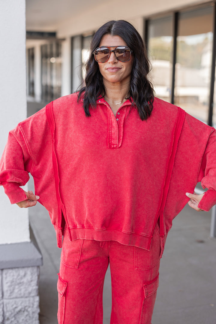Women's washed red french terry knit pullover top with snap front bodice by ee:some showing relaxed, boxy fit