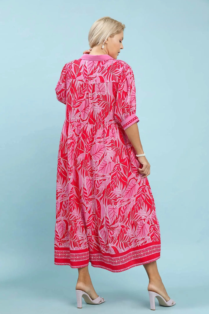 Umgee red and pink tropical palm print plus size midi dress with red embroidery trim and flowy silhouette