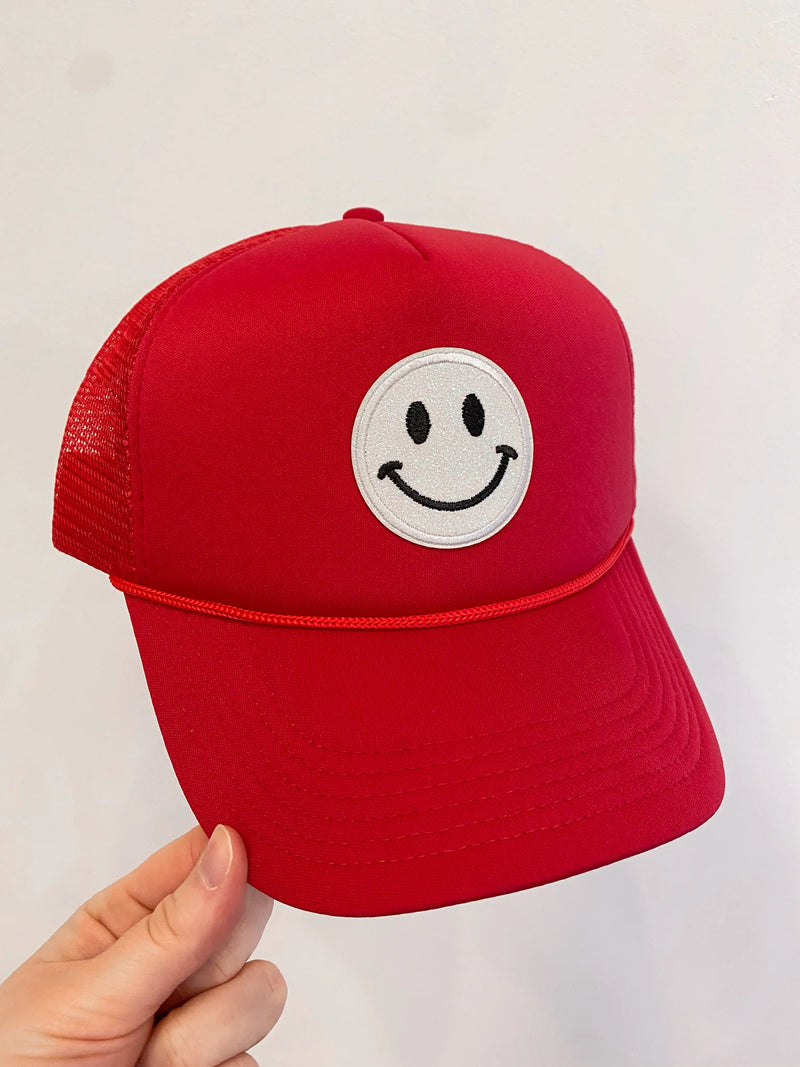 red trucker hat smiley