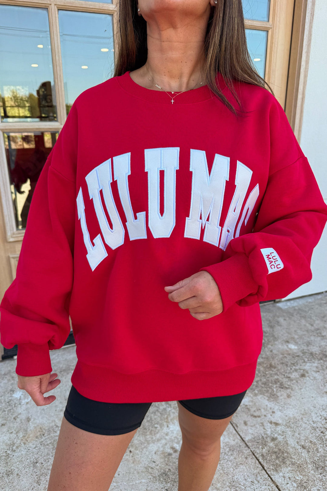 bright red with white embroidered lulu mac long sleeve crew neckline sweatshirt