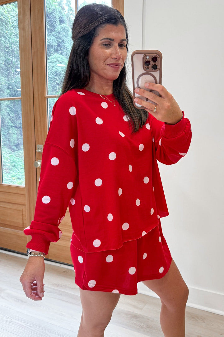 red with white polka dot print long sleeve top and skort matching terry cotton knit set