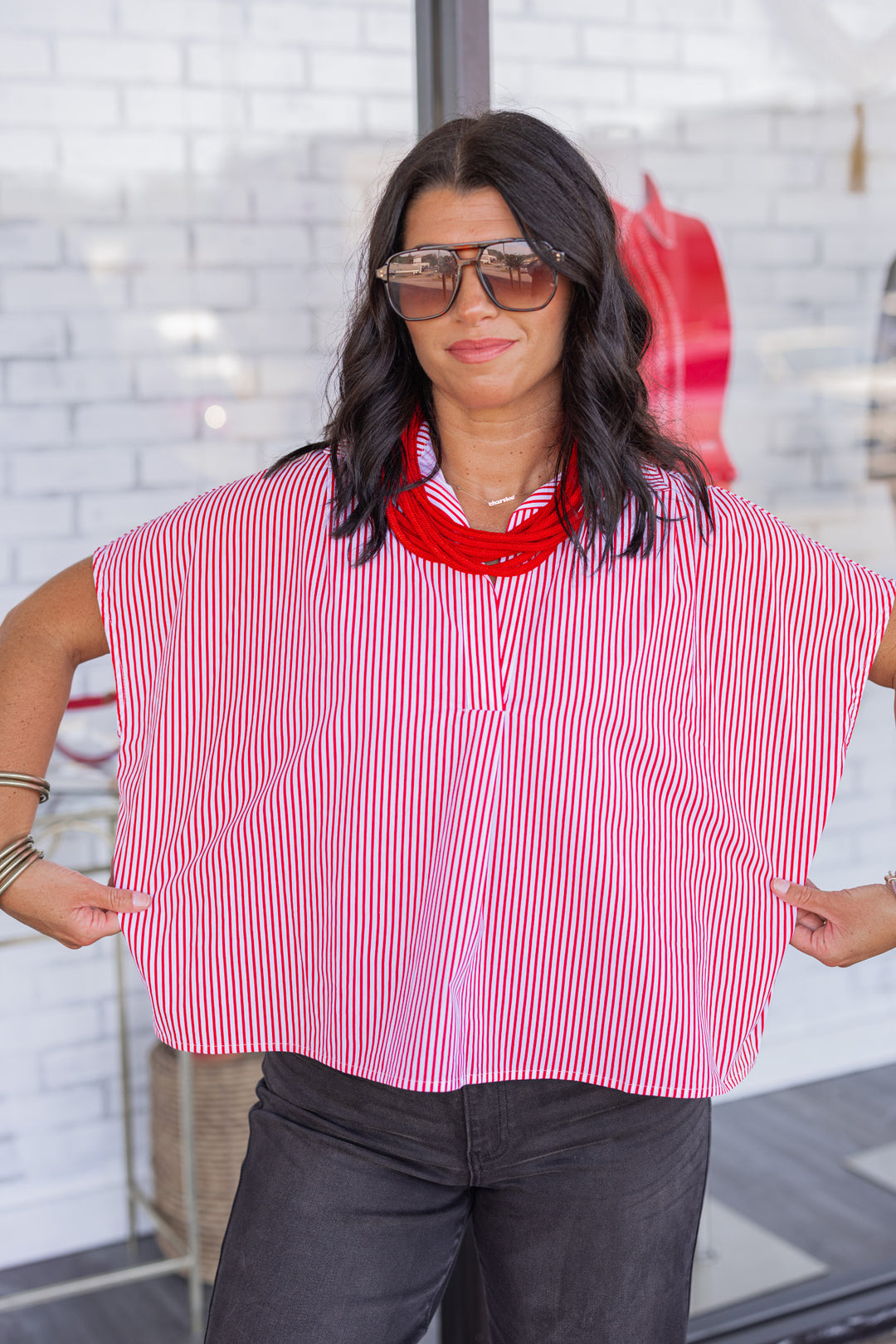Women's red and and white striped dolman short sleeve top by Karlie showing boxy fit