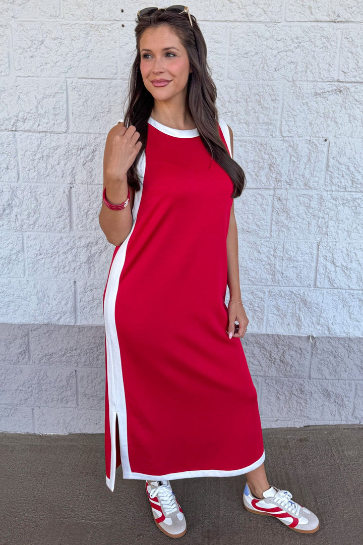 red sleeveless white trimmed knit midi dress with side slits at hem