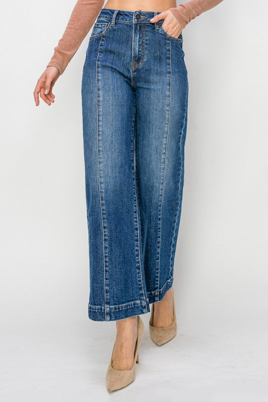 Risen Jeans dark washed denim wide leg ankle jeans with front seam detail showing close up front view