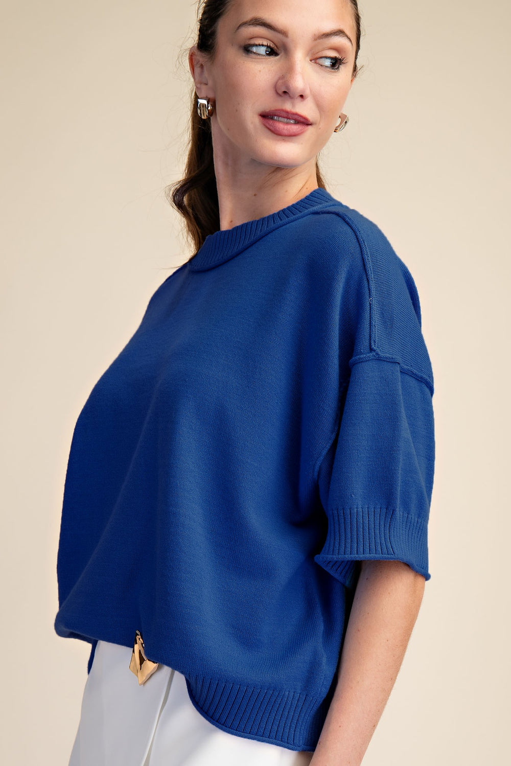 Royal blue knit sweater top with 1/2 length sleeves 