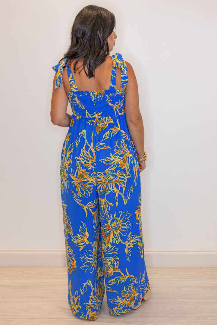 blue sunflower printed wide leg jumpsuit back view
