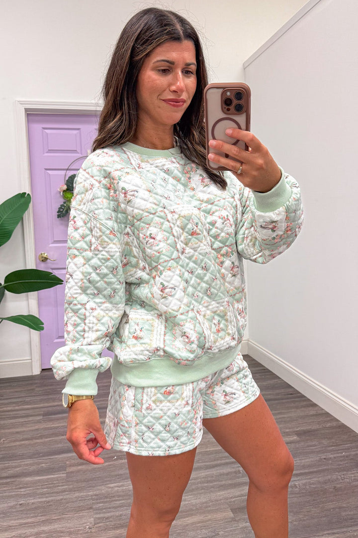 sage with mallard ducks and pink patch floral print crew neckline quilted pullover top