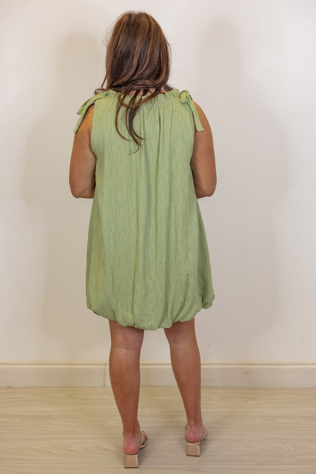 green textured bubble hem short dress