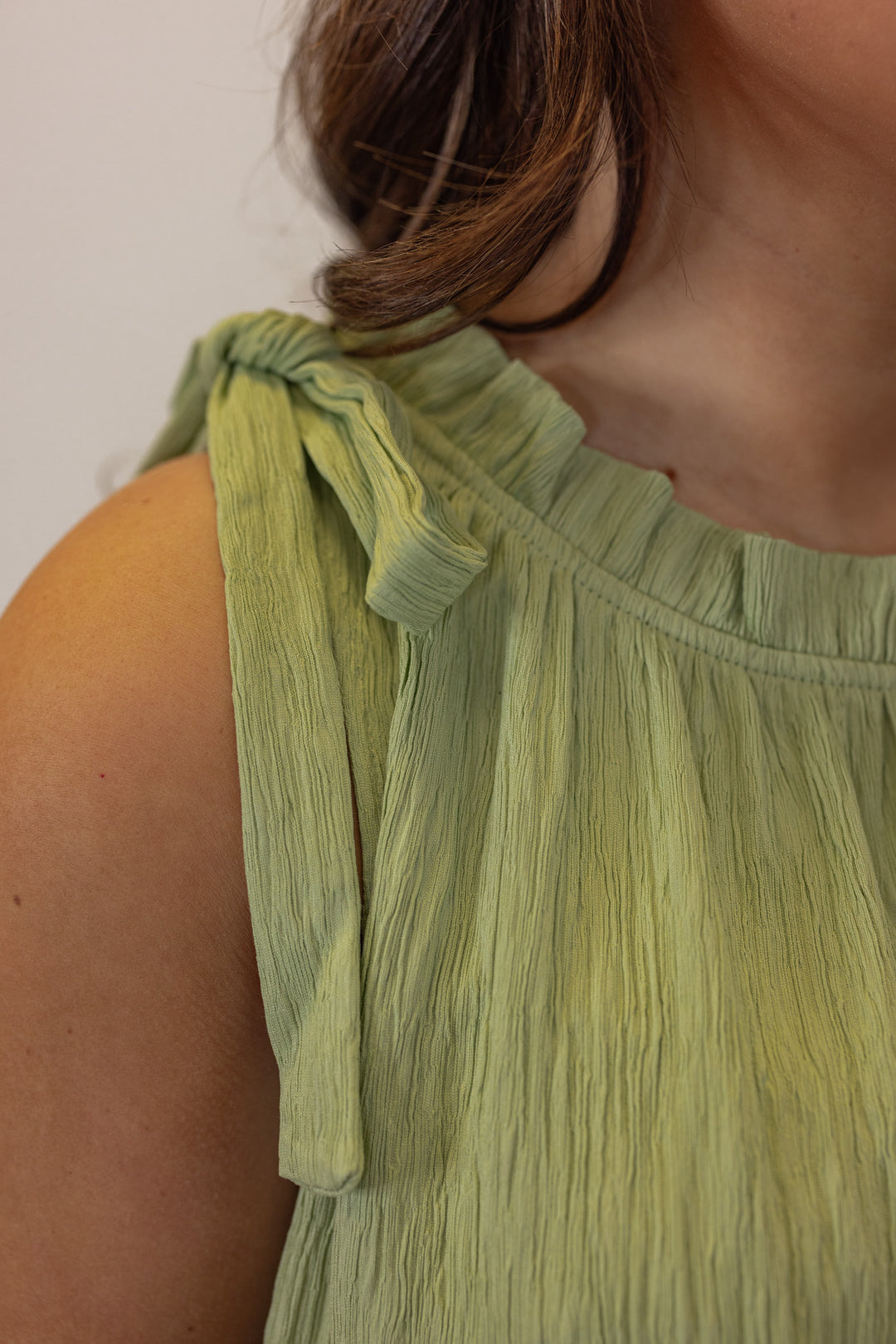 green textured bubble hem short dress