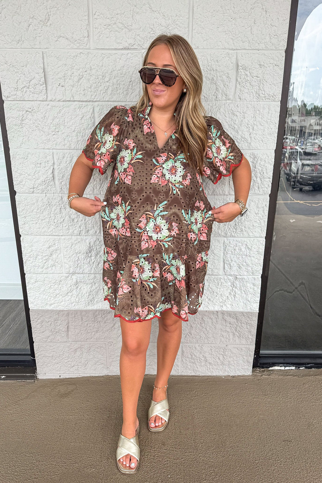 brown eyelet detail dress with fall floral print and rust scallop trim