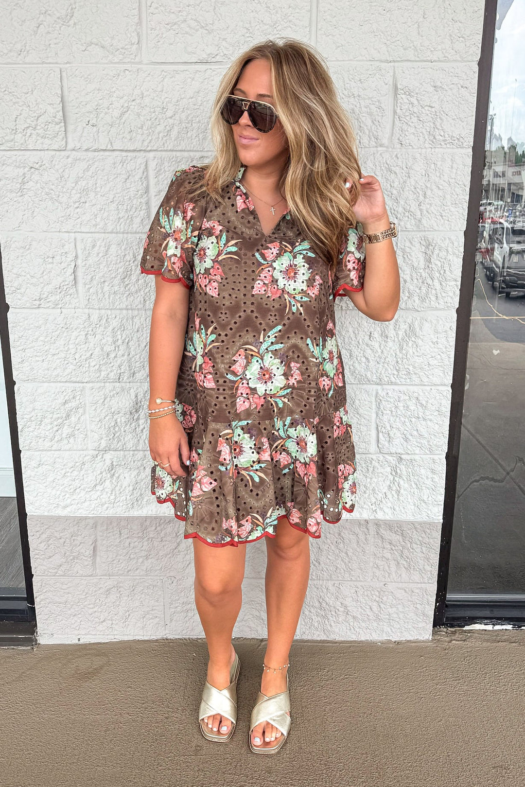 brown eyelet detail dress with fall floral print and rust scallop trim