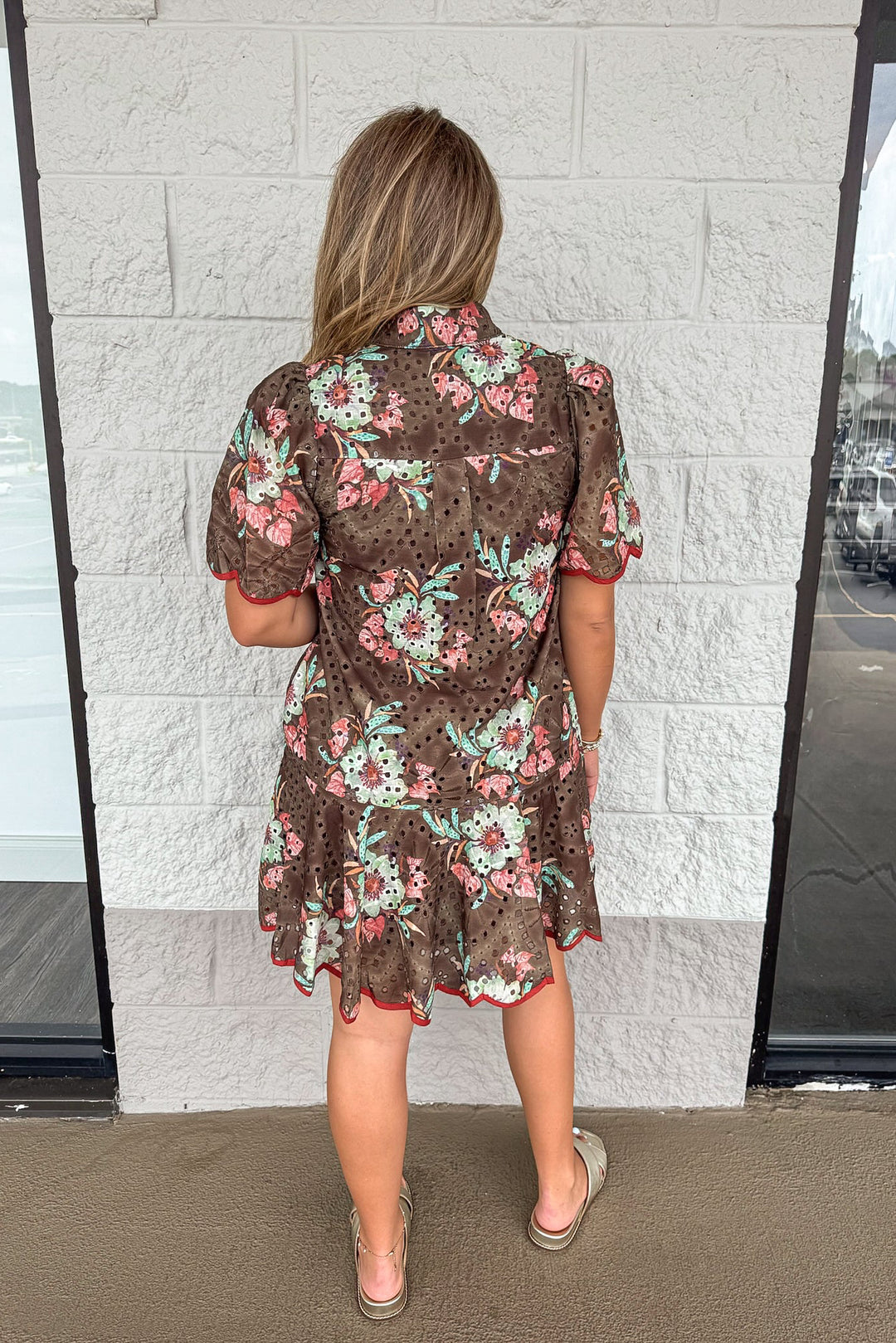 brown eyelet detail dress with fall floral print and rust scallop trim back