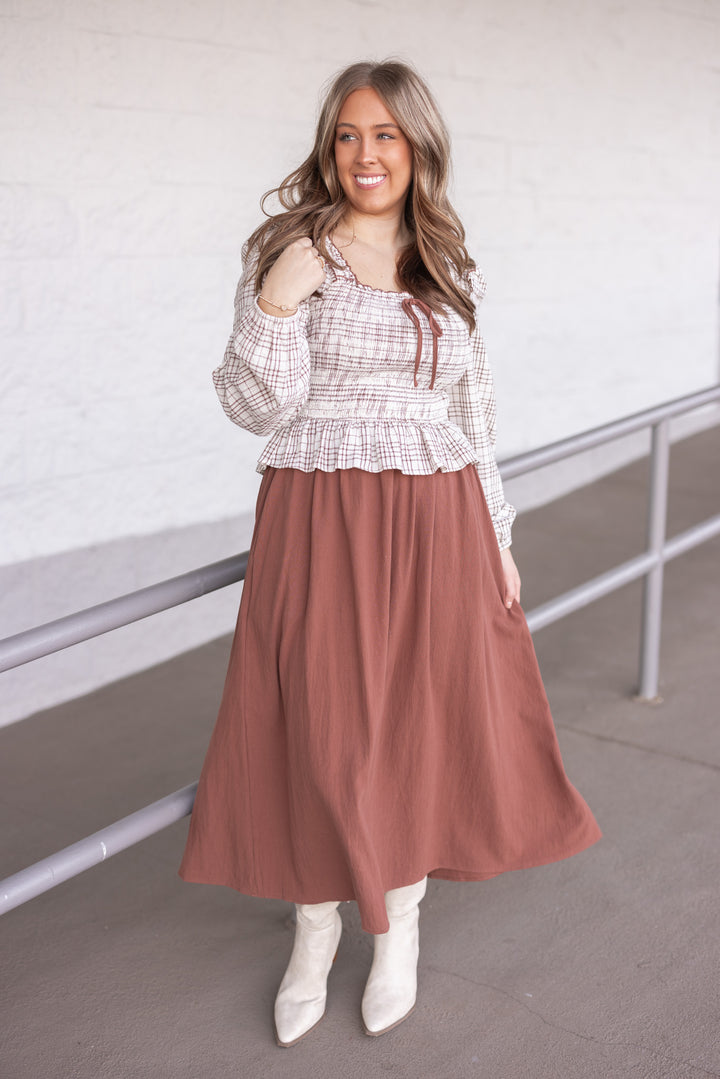 Women's ruffle detailed midi dress with smocked plaid top and solid brown skirt by In February