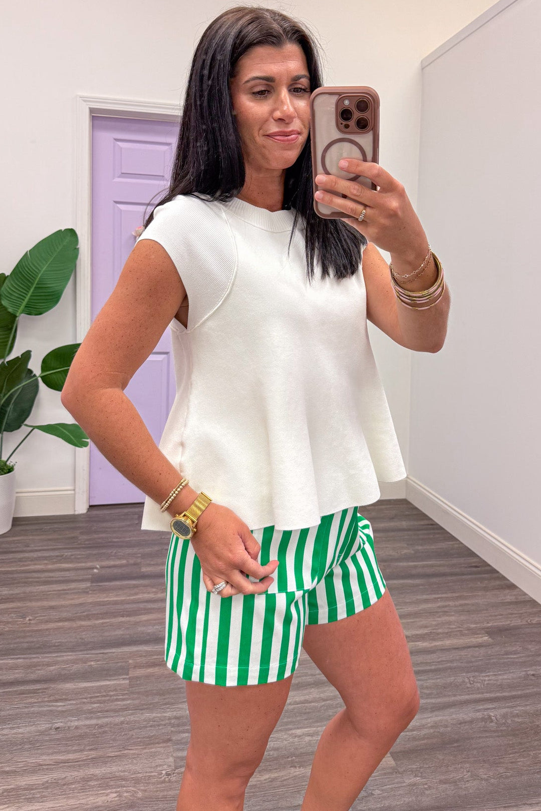 solid cream cap sleeve crew neckline knit top with reverse seam details
