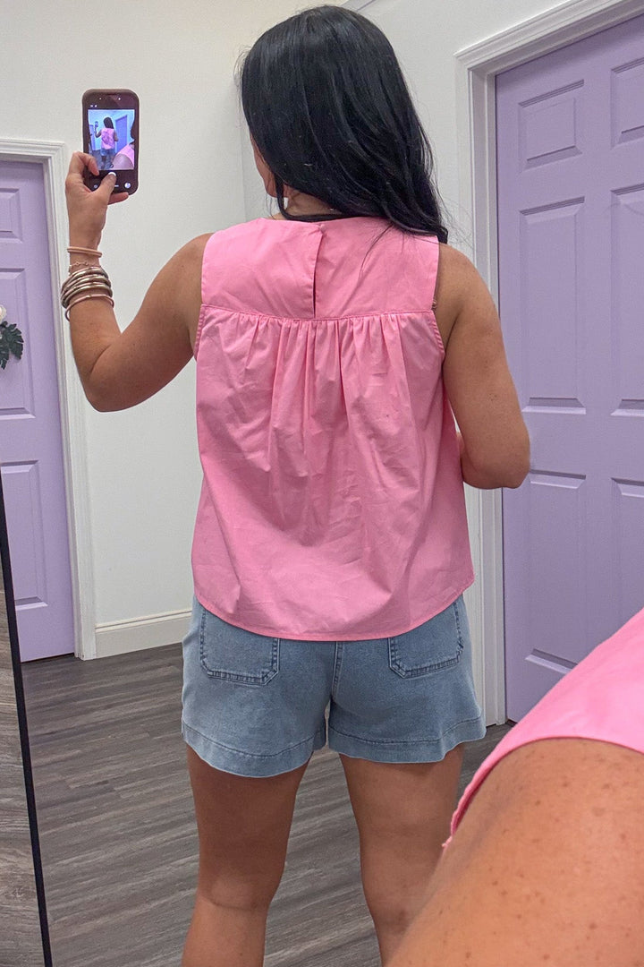 solid pink sleeveless crew neckline top with back keyhole button closure