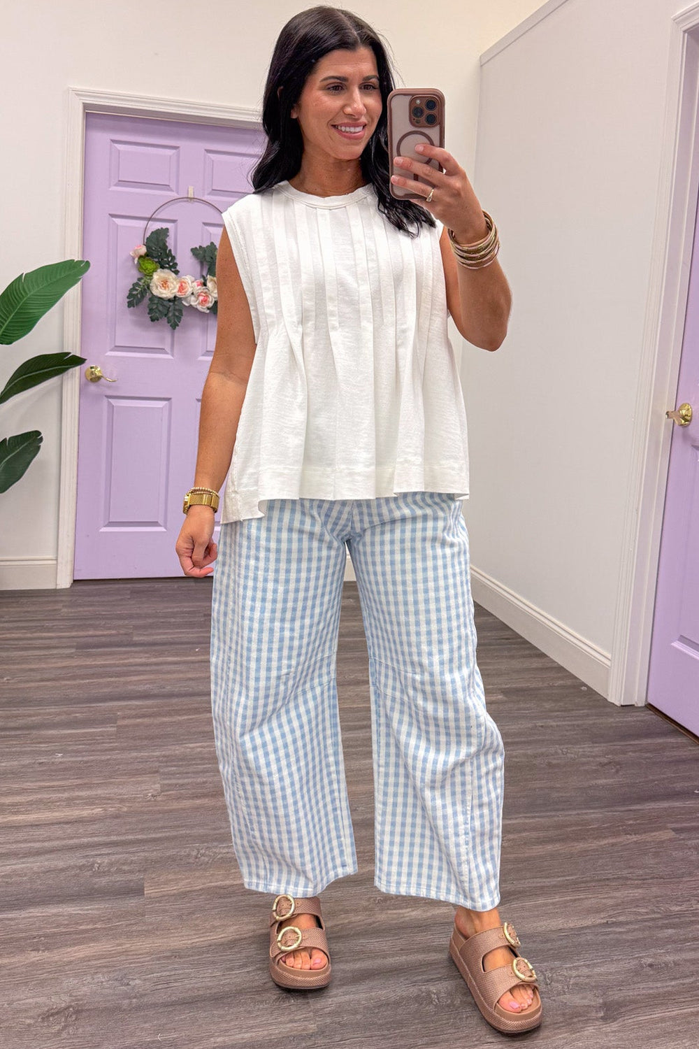 solid white bodice pintuck detail sleeveless ruffled hem cotton top