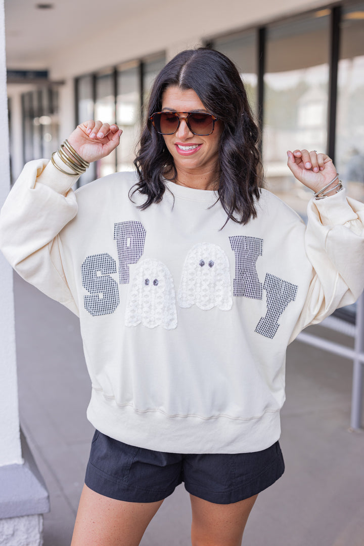 Women's cream sweatshirt with "Spooky" in lace ghosts and black checkered print by Peach Love California