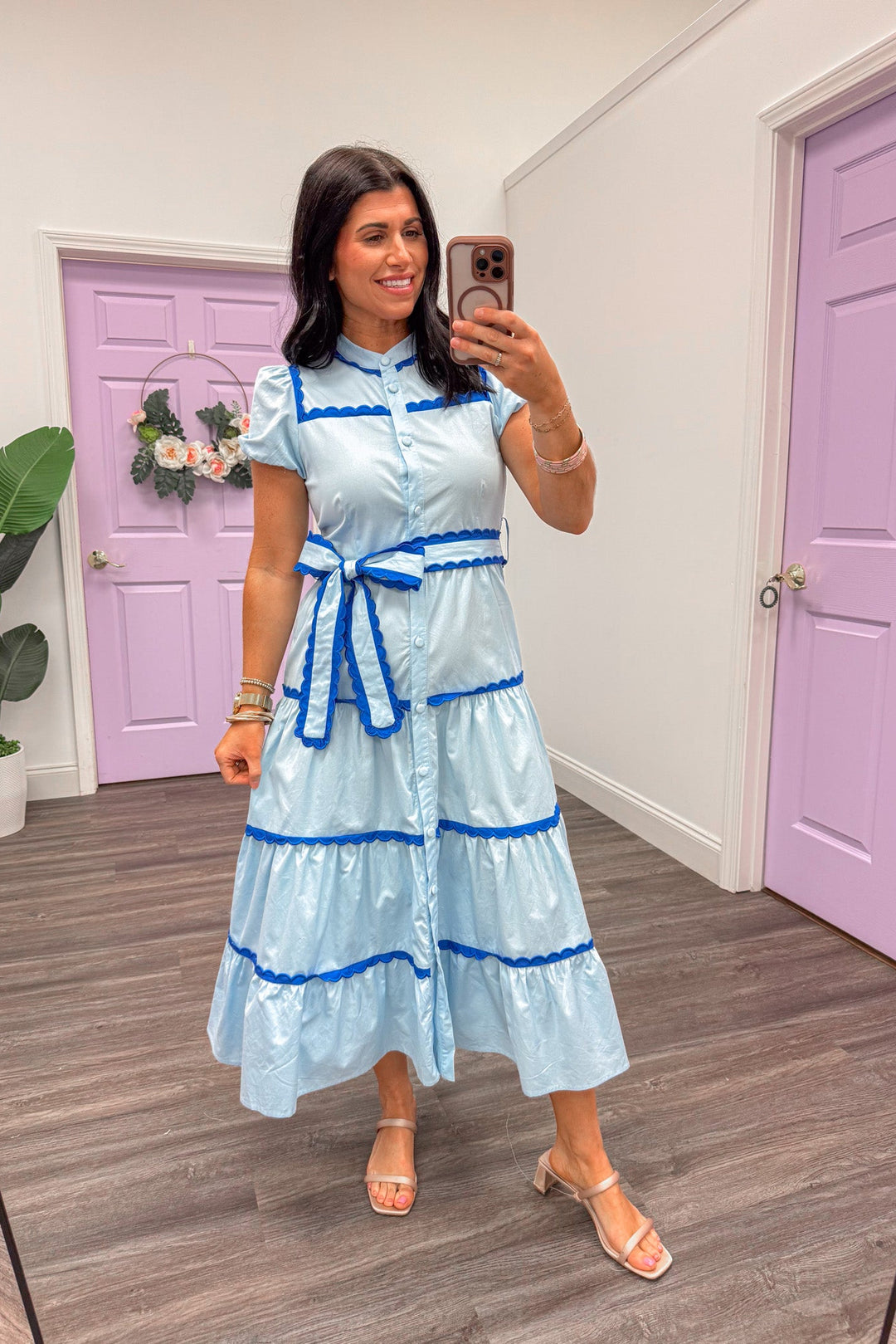 Women's light blue tiered midi dress with dark blue scalloped piping trim