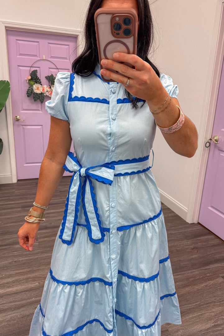 Women's light blue tiered midi dress with dark blue trendy scalloped piping trim