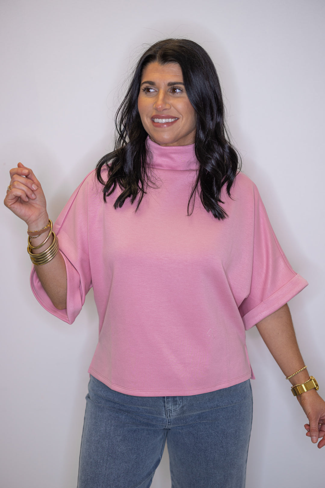 Women's light pink scuba knit top with mock neck and dolman sleeves by Entro