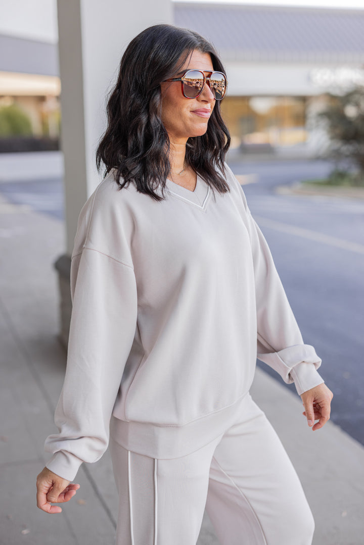 Women's mocha and cream scuba knit top by Rae Mode showing up close side view