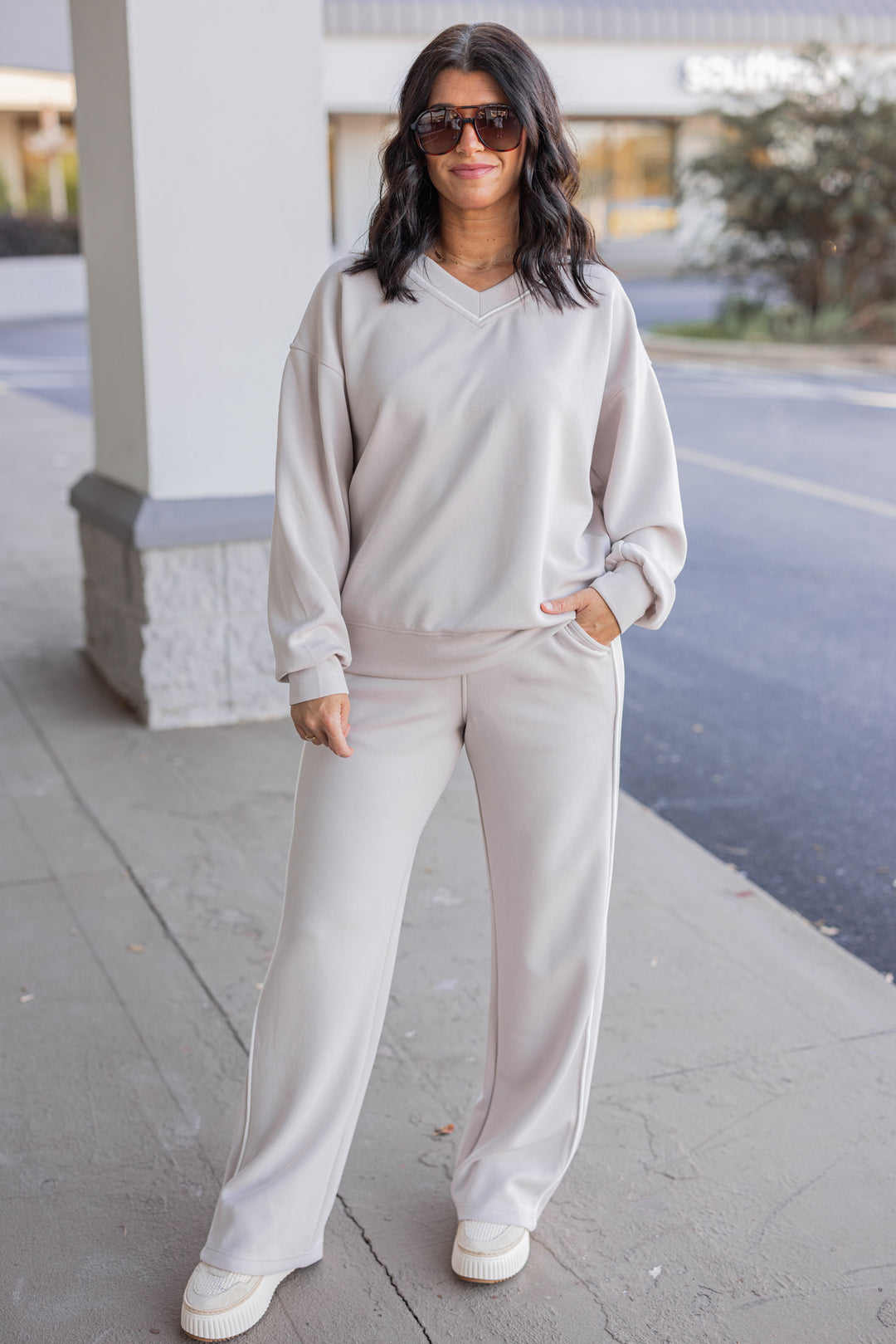 Women's mocha and cream scuba knit top by Rae Mode showing full front view