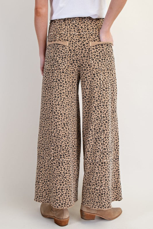 Women's tan cheetah print wide leg knit cargo pants by Easel showing back view