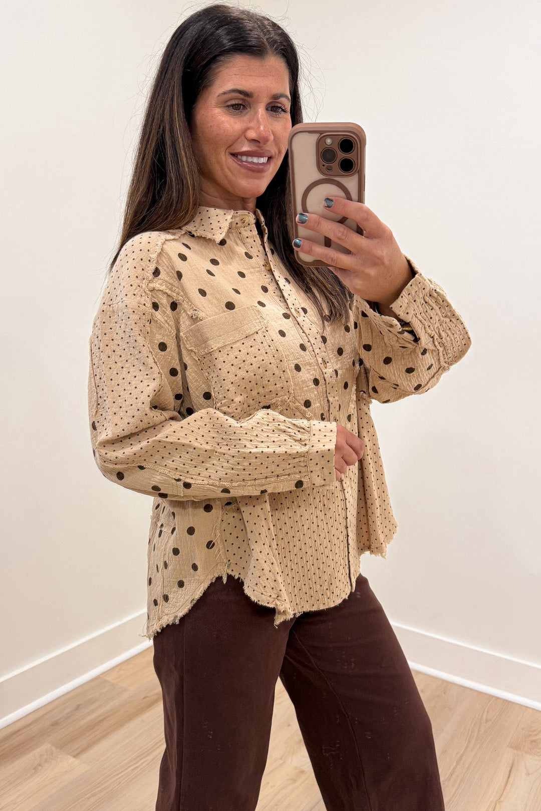 tan with mixed black polka dot print balloon sleeve button front cotton gauze top with one chest pocket
