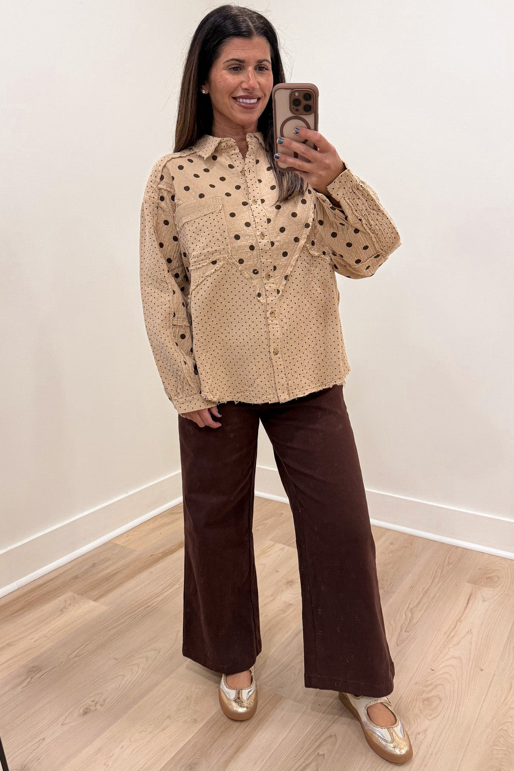 tan with mixed black polka dot print balloon sleeve collared neckline button front cotton gauze top