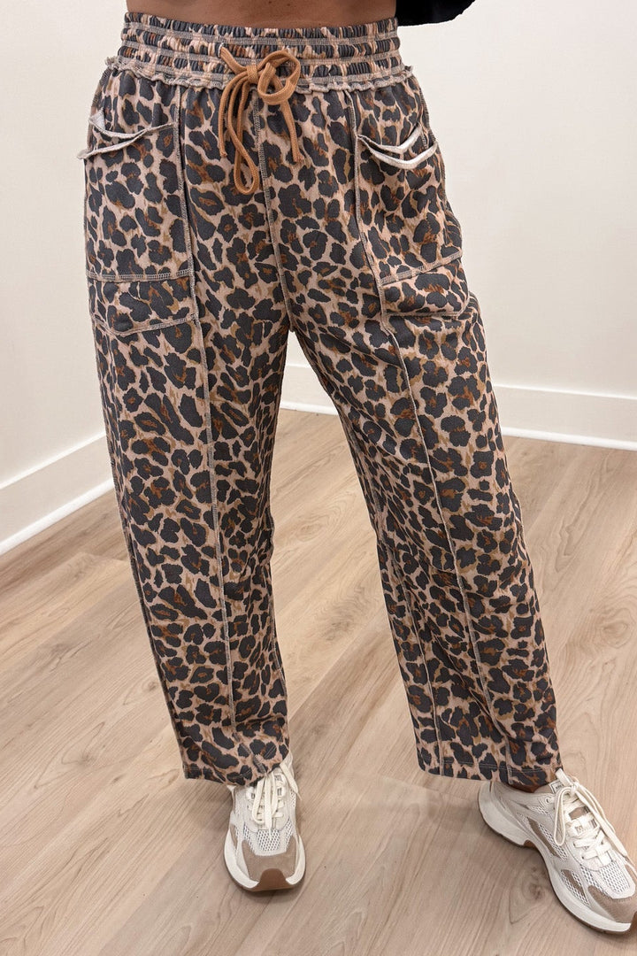 taupe black and brown leopard print french terry knit barrel leg pants with reverse seam details