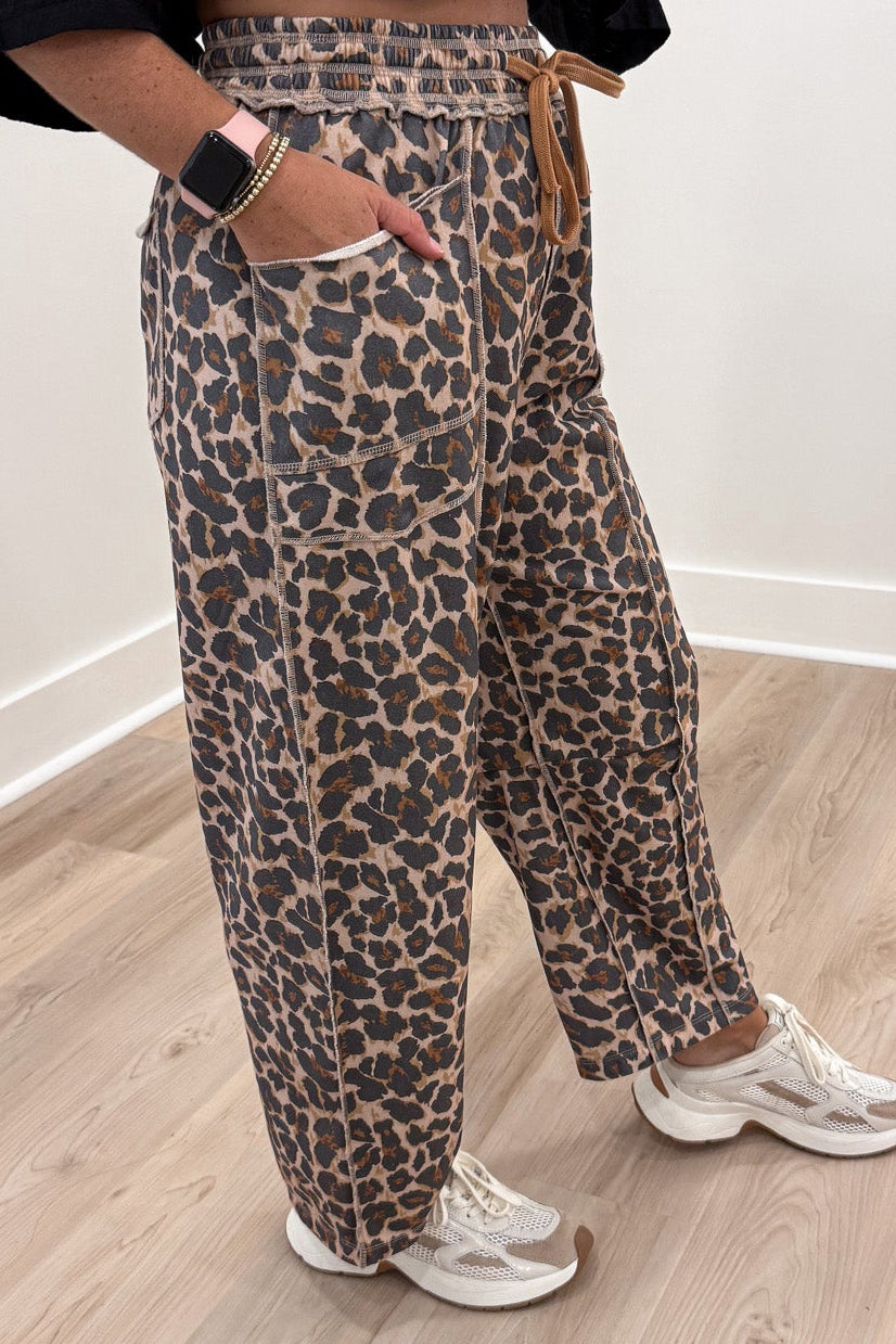 taupe black and brown leopard print french terry knit barrel leg pants with layered front pockets