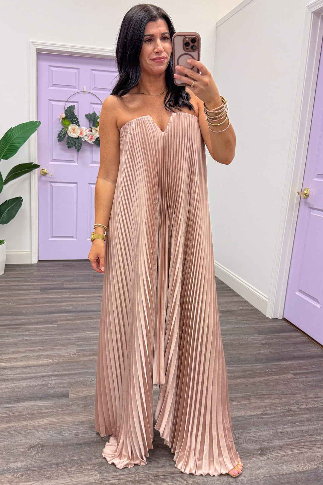taupe pleated strapless asymmetrical shark bite hem maxi dress