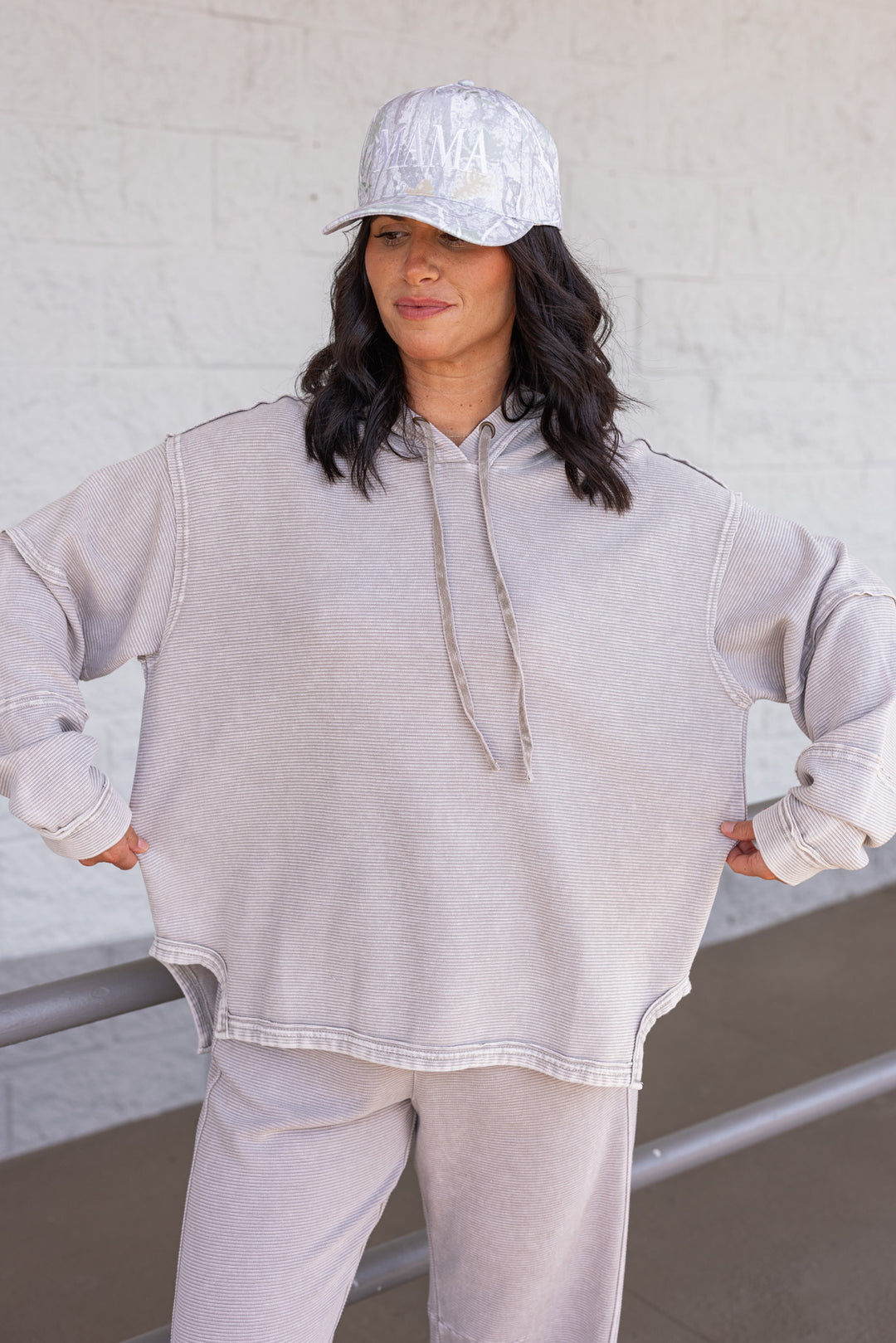 Women's mineral washed heather grey ribbed knit hooded pullover by Easel showing loose relaxed fit