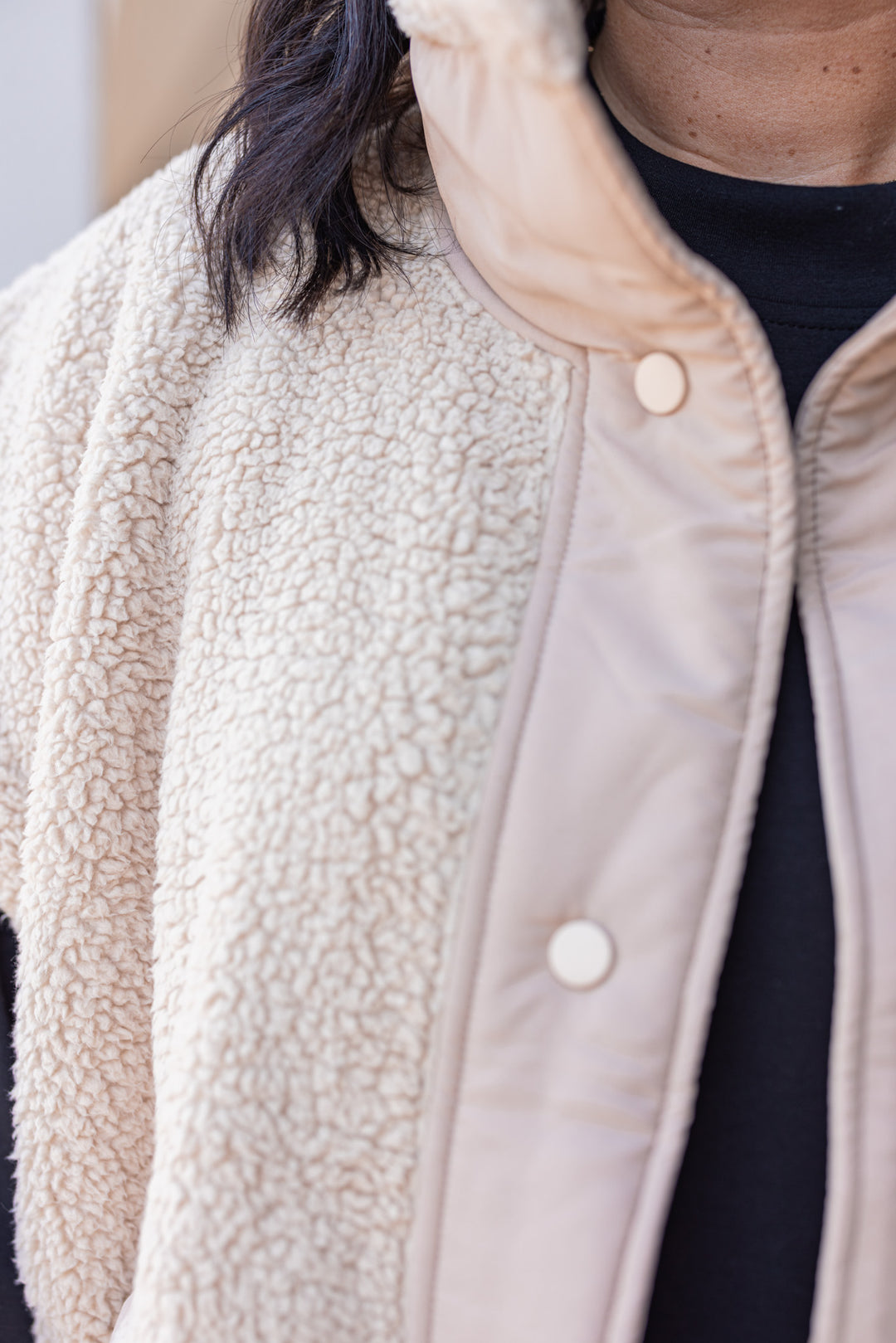 Women's taupe sherpa vest by Rae Mode showing button closures