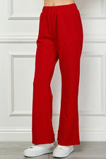 See And Be Seen Textured red flared pants with elastic waistband