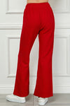See And Be Seen Textured red flared pants with elastic waistband