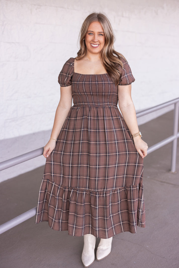 Women's brown plaid midi dress with smocked bodice by Blu Pepper showing full front view