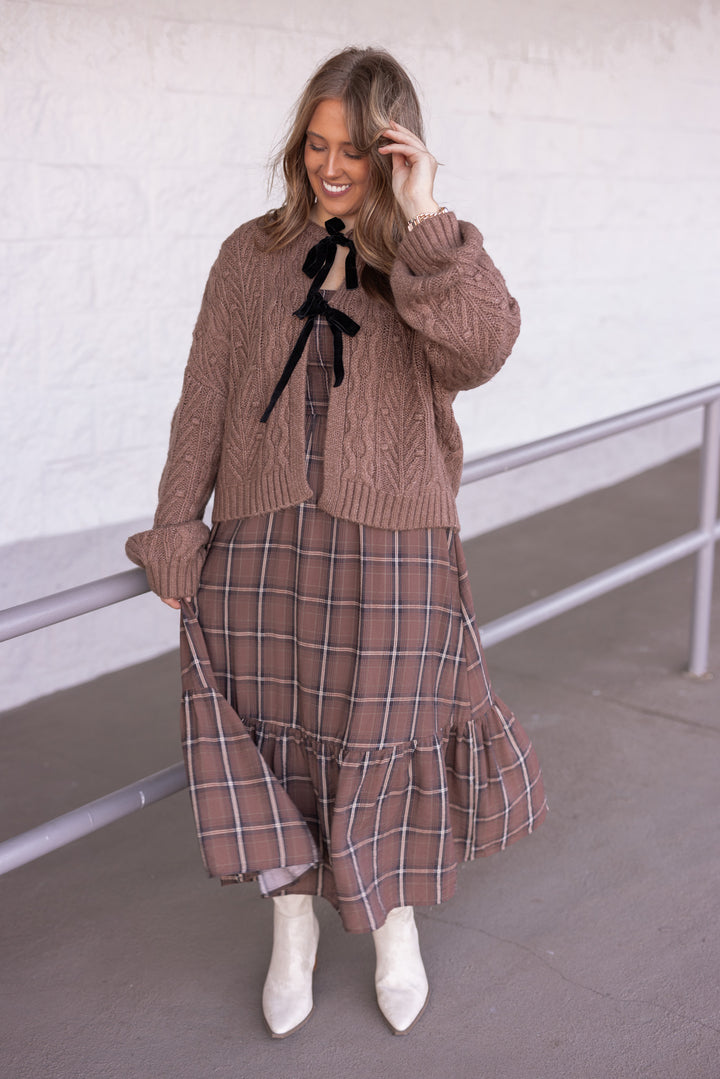 Women's mocha brown cable knit sweater cardigan with black bow tie closure by Blu Pepper, perfect for cooler weather