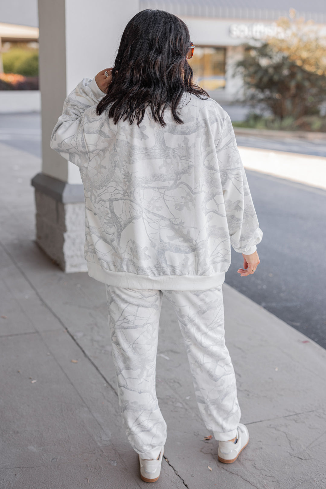 Women's grey snow camo oversized sweatshirt by BucketList showing full back view
