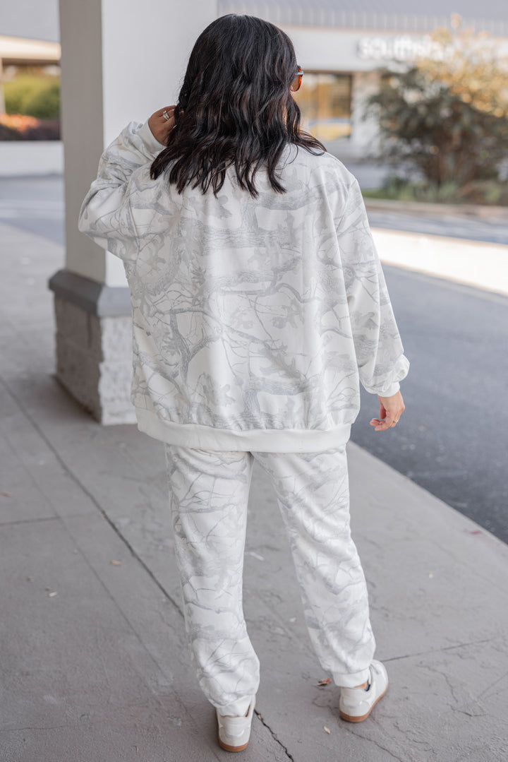 Women's grey snow camo oversized sweatshirt by BucketList showing full back view